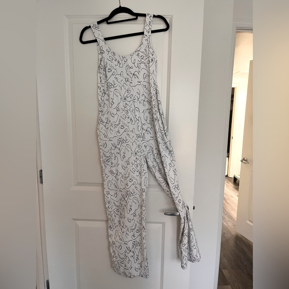 Patterned stretchy loose fitted jumpsuit with pockets!